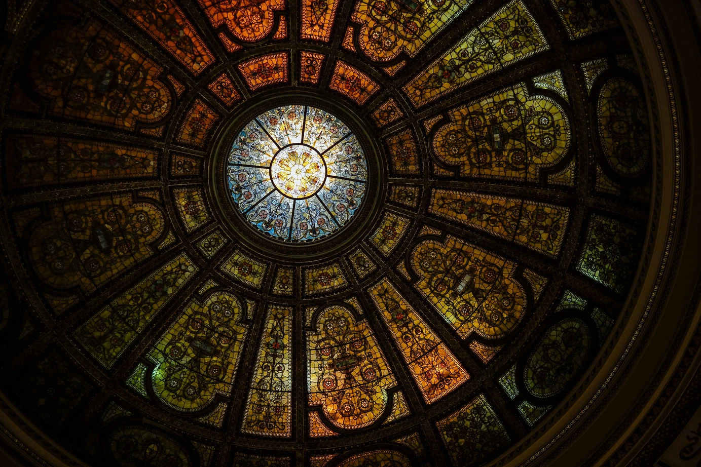 Intricate stained-glass architectural dome